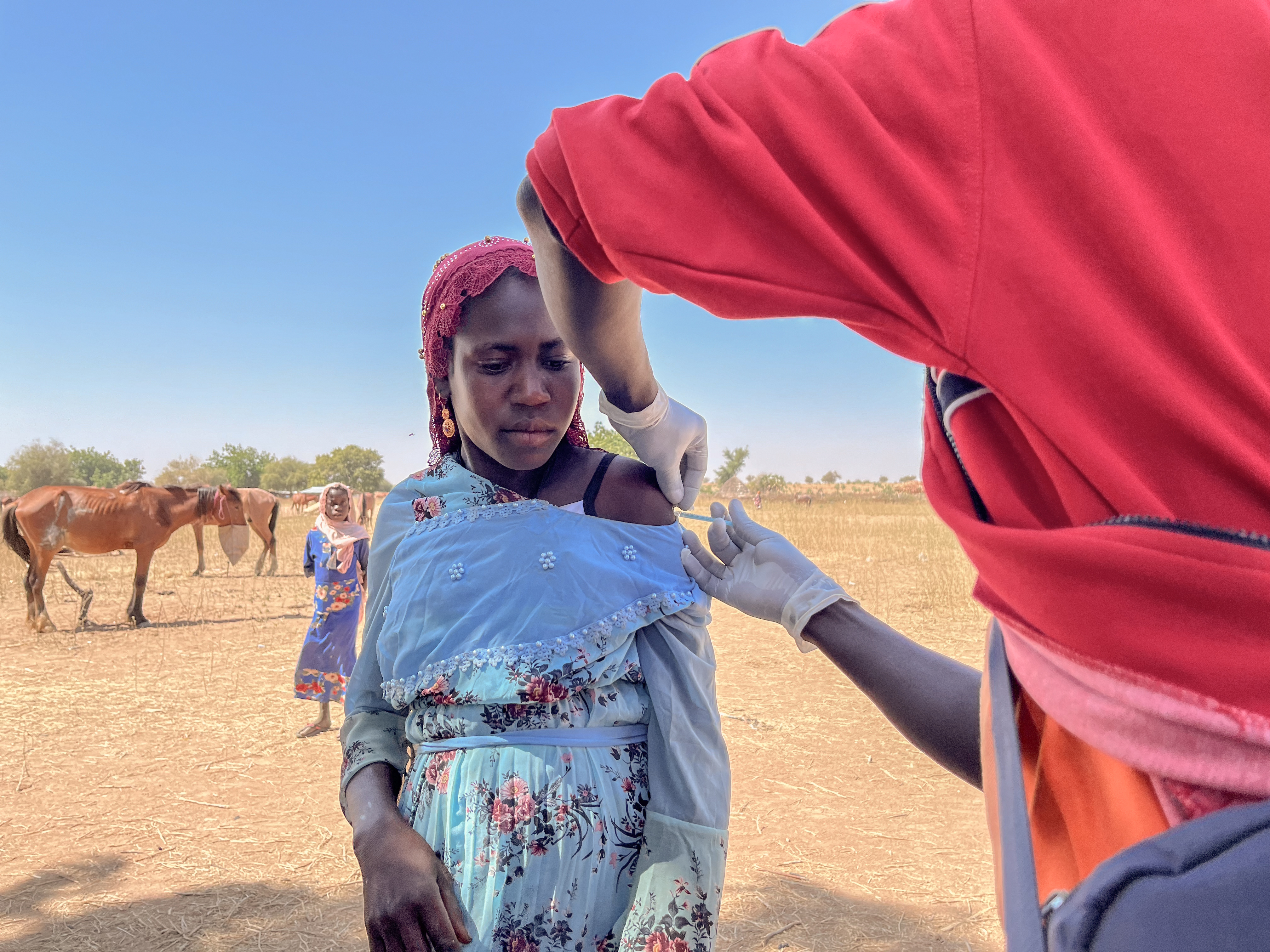 Woman getting vaccinated